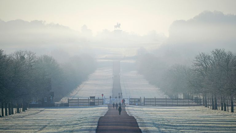 Runners and walkers make use of the Long Walk near Windsor Castle, Berkshire, as the country wakes up after a night when temperatures again dipped below freezing. Picture date: Tuesday January 18, 2022.