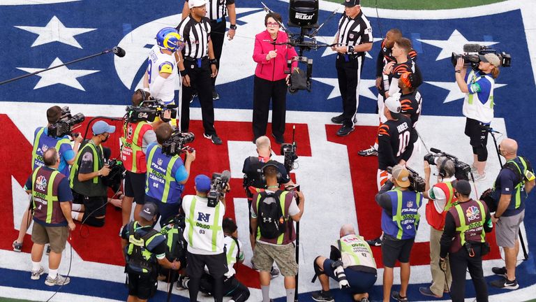 Billie Jean King flips a coin before the NFL's Super Bowl 56.Photo: Associated Press