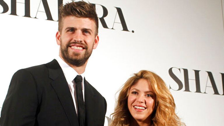 FILE - Colombian singer Shakira, right, and FC Barcelona&#39;s soccer player Gerard Pique pose to the media during the presentation of her new album "Shakira" in Barcelona, Spain, on March 20, 2014. Colombian pop star Shakira and her partner, Spanish soccer star Gerard Piqué, are separating. In a statement released on Saturday by Shakira&#39;s PR firm, the pair said: “We regret to confirm that we are separating. For the well-being of our children, who are our highest priority, we ask that you respect ou