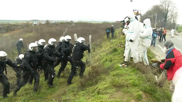Climate protesters clash with police near mine in Germany