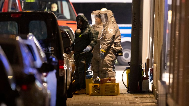 Substances found during the search are examined in Castrop-Rauxel, Sunday, Jan.8, 2023. In Castrop-Rauxel, there was a large-scale operation by the police and fire department on Saturday evening. A special task force (SEK) was also on the scene, a police spokeswoman told the German Press Agency on Saturday evening. (Christoph Reichwein/dpa via AP)