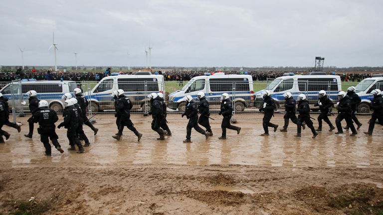Police in riot gear clashed with protesters attempting to get into the Garzeiler mine