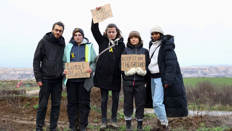 Climate activists Luisa Neubauer, Greta Thunberg, Lakshmi Thevasagayam, and Florian Oezcan protest against the expansion of the Garzweiler open-cast lignite mine of Germany&#39;s utility RWE, in Luetzerath, Germany