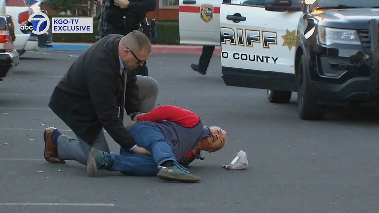 A suspect is arrested after a mass shooting at two locations in the northern California coastal town of Half Moon Bay.  Photo: ABC Affiliate KGO via REUTERS