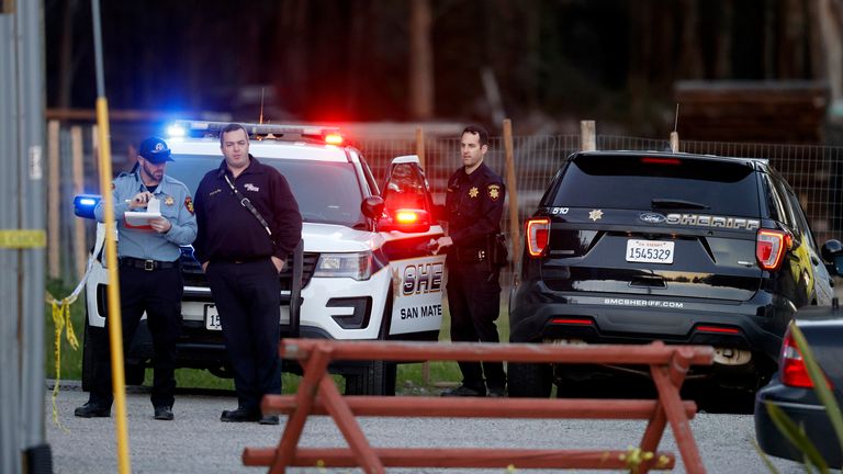 The San Mateo County Sheriff and emergency medical service personnel gathered on a road near where multiple people were shot on Monday.  Half Moon Bay, California, February 23, 2023.Image: San Francisco Chronicle/AP