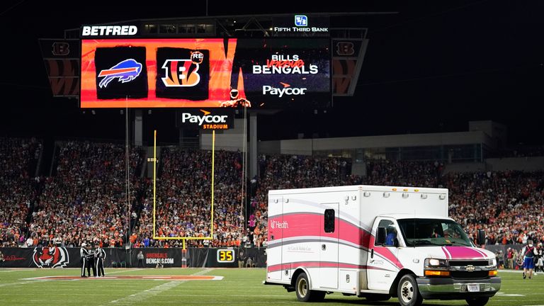 An ambulance leaves the field with Buffalo Bills&#39; Damar Hamlin during the first half of an NFL football game between the Bills and the Cincinnati Bengals, Monday, Jan. 2, 2023, in Cincinnati. The NFL will not resume the Bills-Bengals game that was suspended Monday night after Buffalo safety Damar Hamlin collapsed and went into cardiac arrest on the field, two people familiar with the decision told The Associated Press on Thursday, Jan. 5, 2023. (AP Photo/Joshua A. Bickel), File