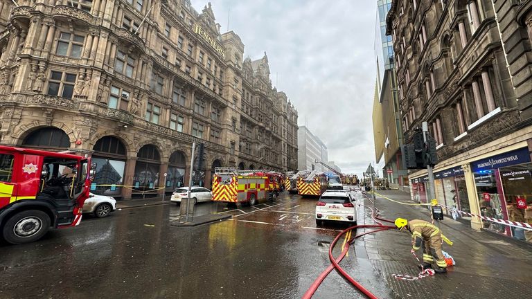Firefighters tackle a blaze at the Jenners building in Edinburgh. The Scottish Fire and Rescue Service were called to fire at the former department store at 11.29am, and the building was found "well alight". A total of 10 fire appliances have been sent to the scene on Rose Street in the city centre. Picture date: Wednesday October 26, 2022.
