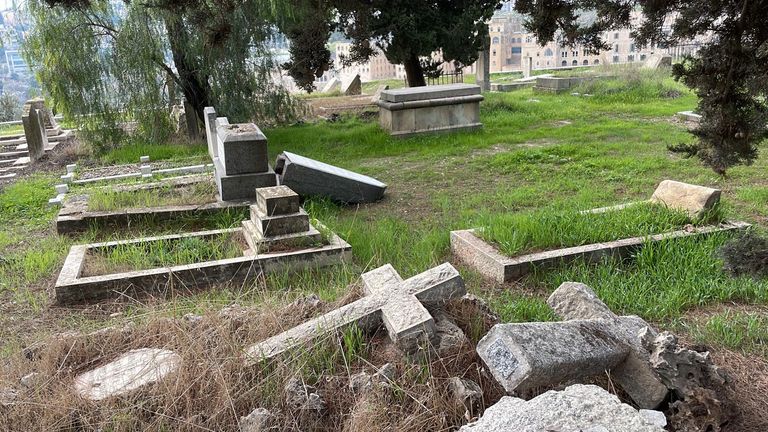 More than 30 Christian graves have been vandalised in a Jerusalem cemetery