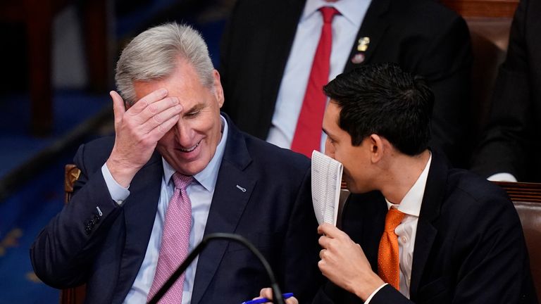 Rep. Kevin McCarthy, R-Calif., listens during the twelfth round of voting in the House chamber as the House meets for the fourth day to elect a speaker and convene the 118th Congress in Washington, Friday, Jan. 6, 2023. (AP Photo/Alex Brandon)