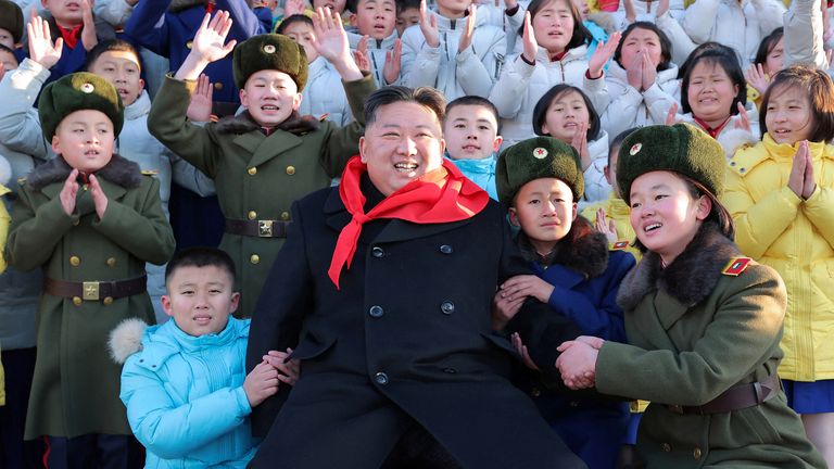 North Korean leader Kim Jong Un poses for a group photo with representatives of the Korean Children&#39;s Union (KCU) under North Korea&#39;s ruling Workers&#39; Party in Pyongyang