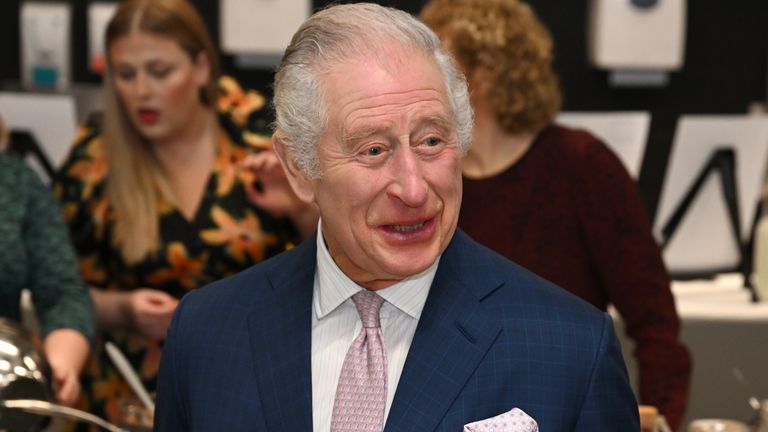 The King joked that he was "100 years late" to visit the factory, which opened 101 years ago. Pic: PA