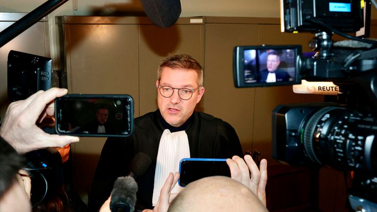 Laurent Kennes, lawyer for former member of the European Parliament Pier Antonio Panzeri, speaks with the media prior to a court hearing regarding detention at the Palais de Justice in Brussels, Tuesday, Jan. 17, 2023. (AP Photo/Olivier Matthys)