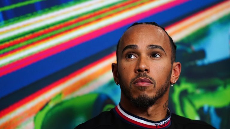 Lewis Hamilton said he had bananas thrown at him and was repeatedly called the &#39;n-word&#39; at school
