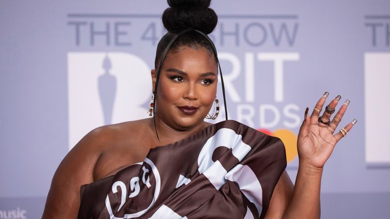 Lizzo poses for photographers as she arrives at the Brit Awards 2020 in London, Tuesday, February 18, 2020. (Photo by Vianney Le Caer/Invision/AP)