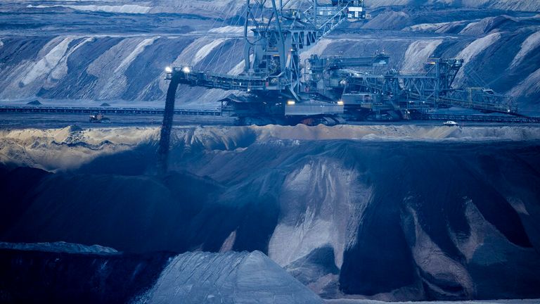 A lignite excavator of energy company RWE operates in the Garzweiler II opencast lignite mine near the village of Luetzerath in Jackerath, Germany, Thursday, Jan. 5, 2023. The village of Luetzerath is abandoned by its inhabitants but occupied by opponents of lignite mining to protest against the continued expansion of fossil fuels.  (Rolf Vennenberg/dpa via AP).  Photo: AP