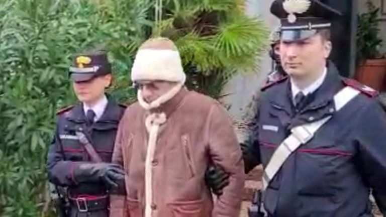 Matteo Messina Denaro, the country's most wanted mob boss, was escorted out of a Carabinieri police station after he was arrested in Palermo, Italy