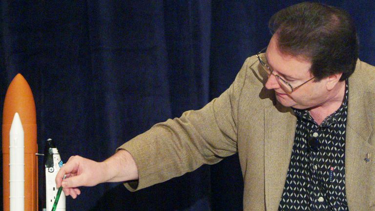 G. Scott Hubbard, a member of the Columbia Accident Investigation Board, points to a model of the space shuttle to illustrate a point during a news conference in Cape Canaveral, Florida, March 26, 2003. Even as the fatal mid-air break-up of shuttle Columbia is being investigated, NASA said it is exploring ways to keep the remaining three space shuttles flying until 2022. The U.S. space agency&#39;s long-term plans call for the shuttle fleet to be active at least until a "next-generation launch tech