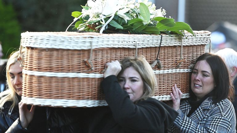 Friends carry the casket of Natalie McNally following her funeral in Lurgan last month
