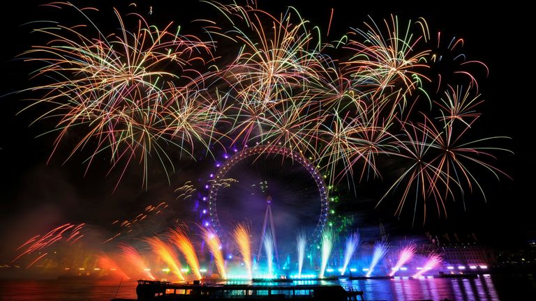 Fireworks explode over the London Eye ferris wheel as Britons across the country welcome the New Year, in London, Britain, January 1, 2023. REUTERS/Maja Smiejkowska