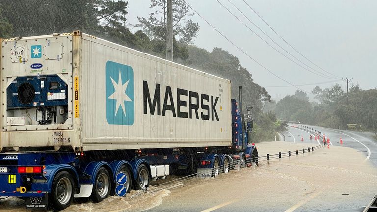 A truck is stopped by flood water near Auckland, New Zealand, 
Pic:New Zealand Herald/AP