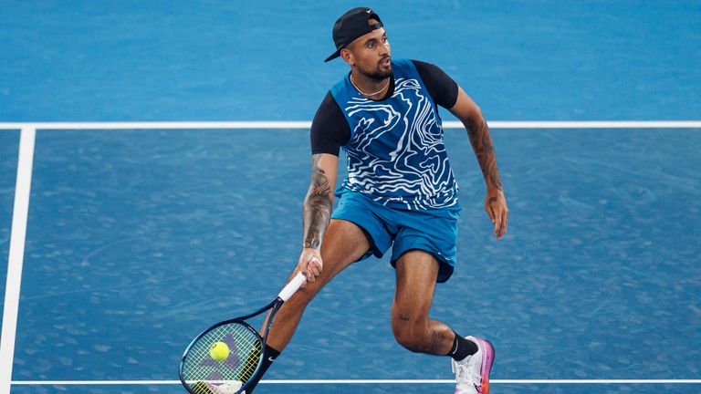 Jan 13, 2023; Melbourne, Victoria, Australia; Nick Kyrgios of Australia hits a shot during an exhibition practice match against Novak Djokovic of Serbia on Rod Laver Arena at Melbourne Park. Mandatory Credit: Mike Frey-USA TODAY Sports