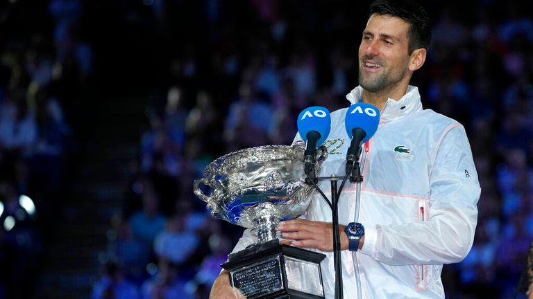 Novak Djokovic of Serbia holds the Norman Brookes Challenge Cup as he makes his post match speech after defeating Stefanos Tsitsipas of Greece in the men&#39;s singles final at the Australian Open tennis championship in Melbourne, Australia, Sunday, Jan. 29, 2023. (AP Photo/Aaron Favila)