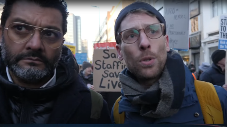 NHS nurse Bert Roman speaking to Sky's Ashish Joshi on the march