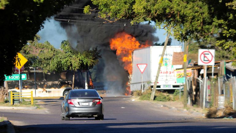 Vehicles and buses were torched by drug gang members 