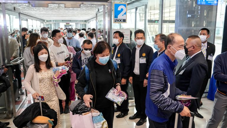 Passengers from China&#39;s Xiamen arrive at Bangkok’s Suvarnabhumi airport after China reopens its borders amid the coronavirus disease (COVID-19) pandemic, in Bangkok, Thailand, January 9, 2023. REUTERS/Athit Perawongmetha
