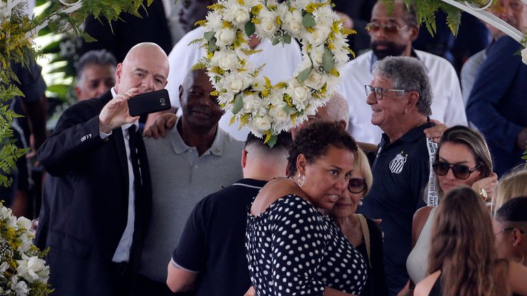 Gianni Infantino takes a selfie by Pele&#39;s coffin
