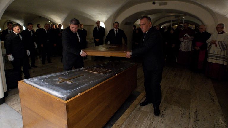 The third coffin of former Pope Benedict is closed in the Vatican's Holy Grotto.  Photo: Vatican Media/Reuters