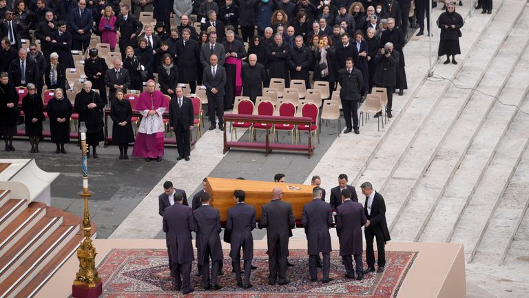 The coffin of the late Pope Emeritus Benedict XVI is brought to St. Peter's Square for a mass at the Vatican on Thursday, January 5, 2023.  Benedict died at the age of 95 on December 31 in a monastery on the grounds of the Vatican.  where he spent almost all the decades of his retirement.  (AP Photo/Ben Curtis)