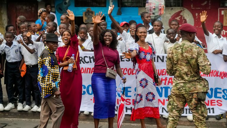 People cheer at Pope Francis as he arrives in Kinshasa, Democratic Republic of the Congo
Pic:AP