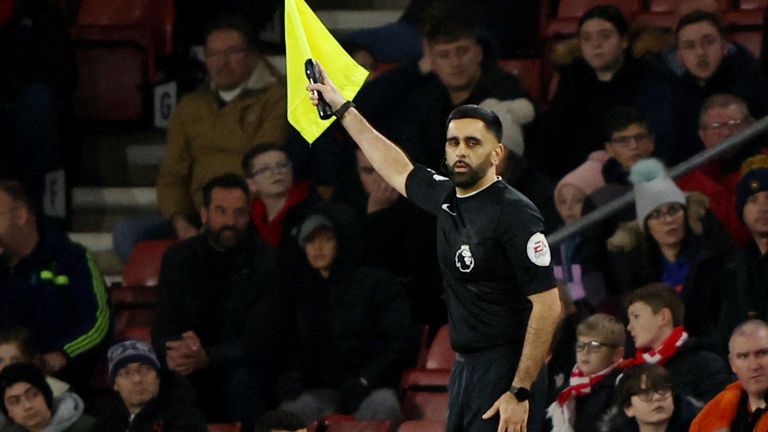 Bhupinder Singh Gill signals during the Premier League game