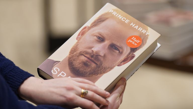 A person holds a copy of the newly released autobiography from the Duke of Sussex, titled Spare, at Waterstones Piccadilly, London, as it goes on sale to the public for the fist time. Picture date: Tuesday January 10, 2023.
