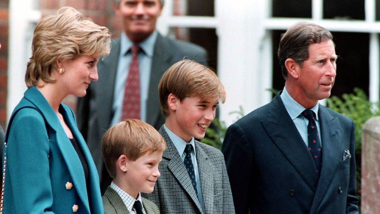 The Prince and Princess of Wales, and Prince Harry smile to photographers with Prince William (2R), second in line to the throne, at his first day of term at the world famous Eton College September 6.  Prince William and other new boys known as "Tits" will attend their first classes tomorrow in the distinctive school uniform