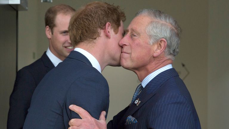 Prince Harry pictured with his father, King Charles, and brother, Prince William, in 2014 - before the family rift
