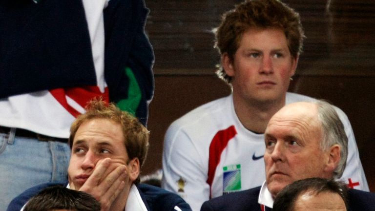 Britain's Prince William, bottom left, and Prince Harry, top right, react during the Rugby World Cup final between England and South Africa at the Stade de France in Saint Denis, a suburb of Paris , Saturday, October 20, 2007. South Africa won the match 15-6.  (AP Photo/Matt Dunham)