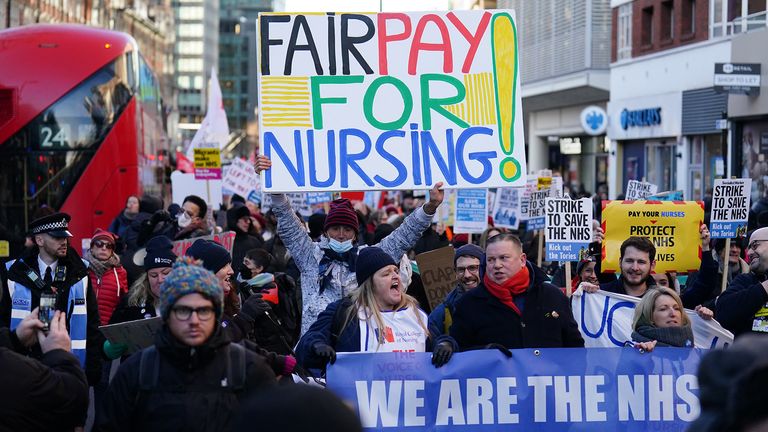 Protesters march on Tottenham Court Road in London, towards Downing Street, during the nurses strike, against the Bill on minimum service levels during strikes. Picture date: Wednesday January 18, 2023.