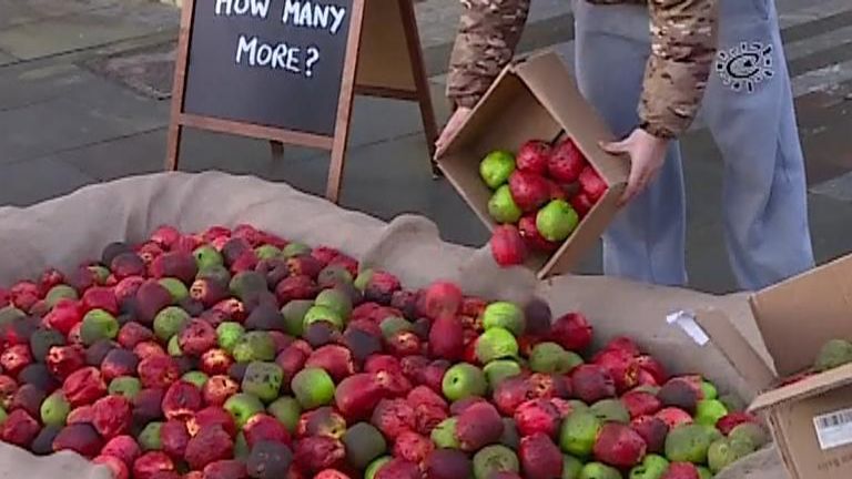 Protesters bring rotten apples to New Scotland Yard to highlight investigations into officers accused of domestic abuse. The CEO of Refuge, Ruth Davison, says for people suffering domestic abuse &#39;the bariers are even higher if your perpetrator is a police officer&#39;.