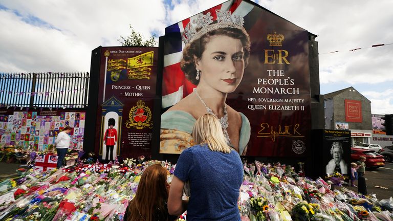People pay their respects to the Queen in Belfast after her death