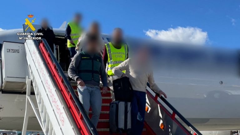 Agents of the Spanish Civil Guard are seen during the detention of UK national Richard Masters, at the request of U.S. authorities, for allegedly facilitating a scheme of sanctions evasion and money laundering in relation to a yacht of Russian oligarch Viktor Vekselberg, at the Adolfo Suarez Madrid-Barajas Airport in Madrid, Spain, in this handout picture taken January 20 and released January 23, 2023 