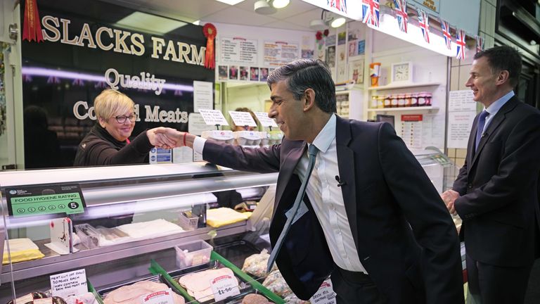 Prime Minister Rishi Sunak meets stall holders during a community project visit to Accrington Market Hall in Lancashire, as a £2 billion investment in over 100 projects across the UK, through the levelling up fund has been announced. Picture date: Thursday January 19, 2023.