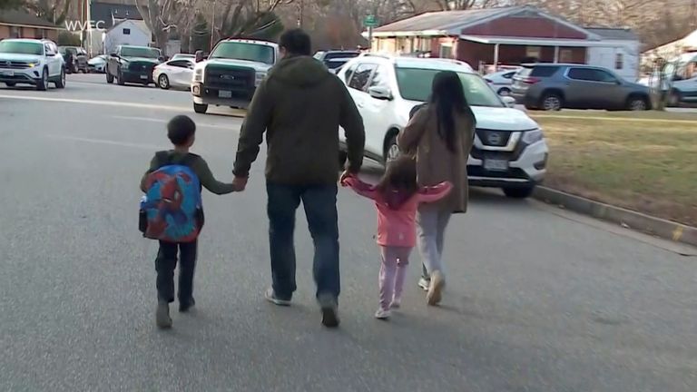 Parents walk with children outside Richnick Elementary School, where a six-year-old boy shot and wounded a teacher, according to police, in Newport News, Virginia, U.S., Jan. 6, 2023. In this screen grab from the handout video.  WVEC via ABC/Handout via REUTERS This photo was provided by a third party New Zealand.  No commercial or editorial sales in New Zealand.  outside the United States.  No commercial or editorial sales in the United States.  No resales.  No archives.  Compulsory credit.  Do not OB.