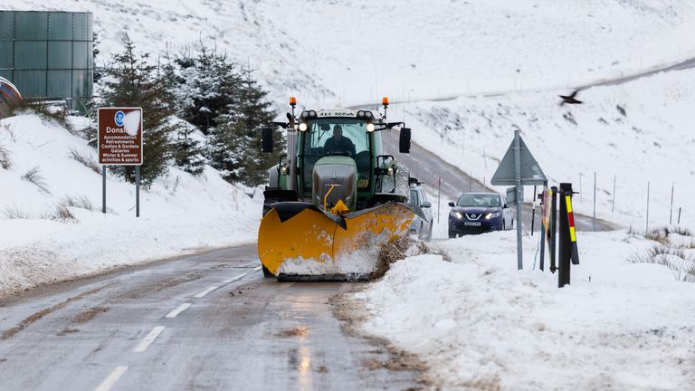 A snow plough clears the A939 after heavy snowfall in the Scottish Highlands. A yellow warning of snow and ice has been issued for northern Scotland as the Met Office said the deadly bomb cyclone that sent temperatures plunging in the US is now causing wet and windy weather in the UK. Picture date: Friday December 30, 2022.

