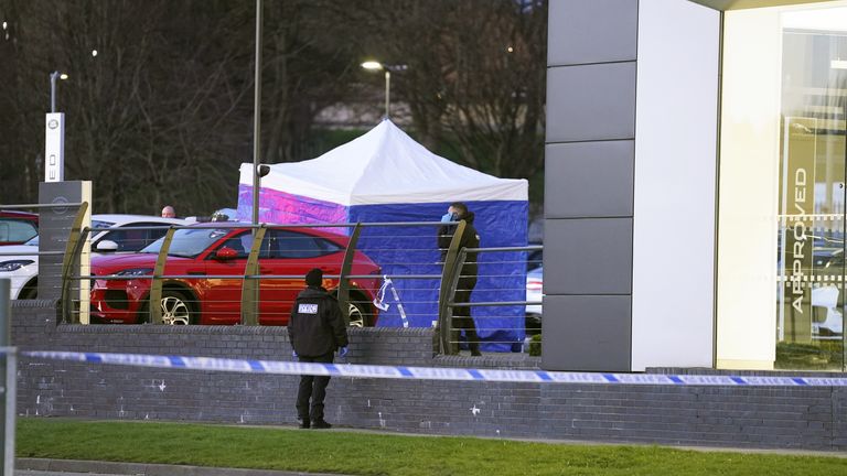 A police tent outside Vertu Jaguar Leeds dealership in Scott Hall Road, Leeds