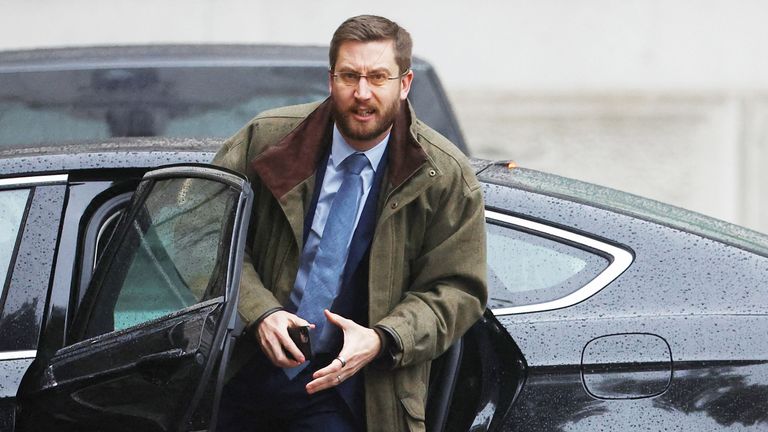 British Cabinet Secretary and Head of the Civil Service Simon Case gets out of a car outside Downing Street   