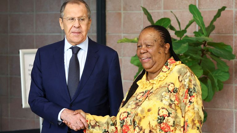 South Africa&#39;s Foreign Minister Naledi Pandor shakes hands with Russia&#39;s Foreign Minister Sergei Lavrov, ahead of their bilateral meeting in Pretoria, South Africa