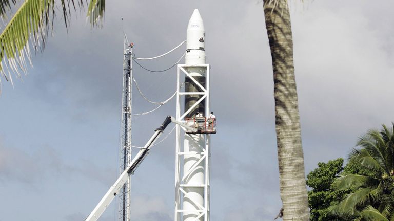 SpaceX engineers make final preparations for the Falcon 1 rocket at the Ronald Reagan Ballistic Missile Test Range on Omelek Island, Marshall Islands, Pacific Ocean