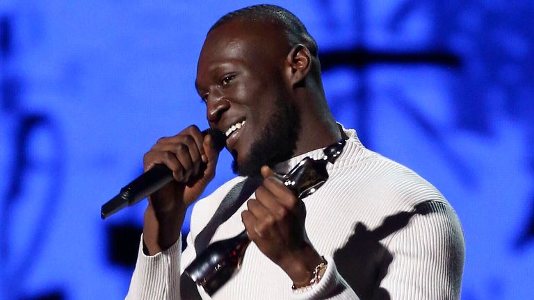 Stormzy accepts his award for Male Solo Artist of the Year on stage at the Brit Awards 2020 in London, Tuesday, Feb. 18, 2020. (Photo by Joel C Ryan/Invision/AP)